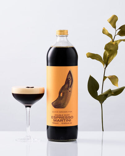 Double Shot Espresso Martini bottle beside a served martini