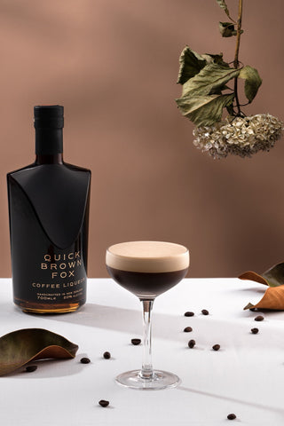 Quick Brown Fox coffee liqueur bottle with an espresso martini
