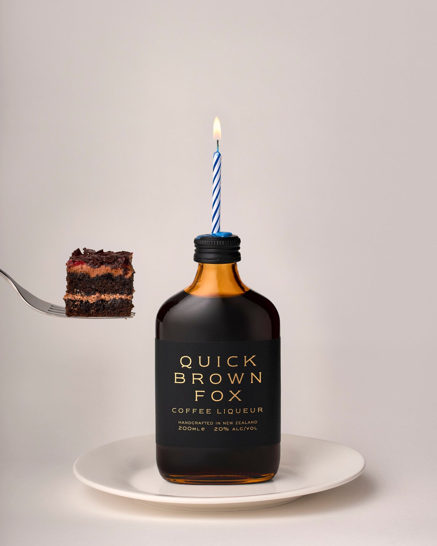 Quick Brown Fox Coffee Liqueur 200ml with cake and candle